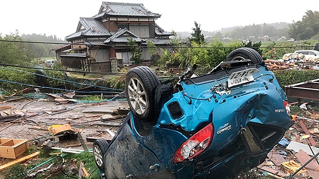 Число жертв тайфуна-убийцы в Японии стремительно растет