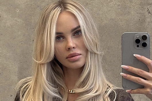 Прибавившая в весе Погребняк снялась в дерзком боди и колготках: фото