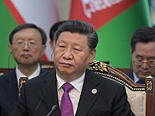 Торговые споры нельзя решать на основе протекционизма, заявил Си Цзиньпин