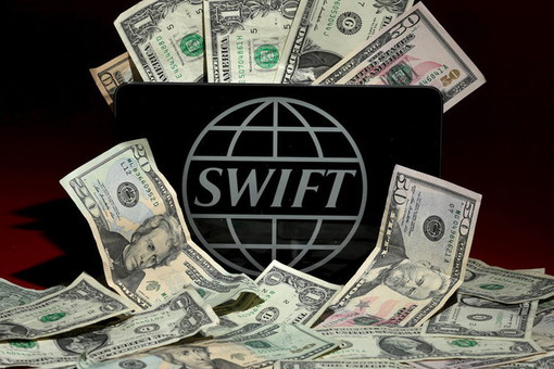 РИА Новости: доля доллара в платежах системы SWIFT снизилась до 46,56%