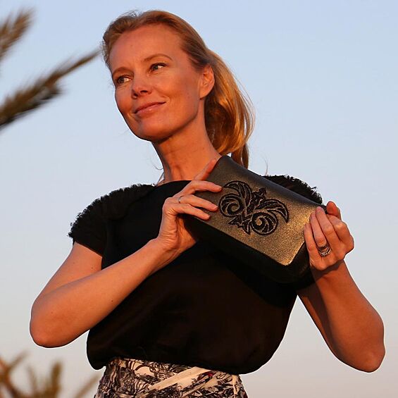 С 1995 по 2005 года Мария Кежа работала дизайнером во французской компании Lancel. 