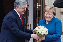 Цветы от другого: Меркель заговорила по-украински