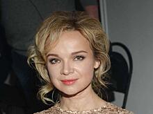 «В одной руке — флажок СССР, в другой — Украинской ССР»: Цымбалюк-Романовская на детском фото