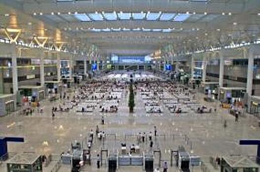 В аэропортах Шанхая заработала система прохода на рейс без посадочных талонов