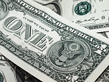 Почему на долларовых купюрах напечатана одна фраза