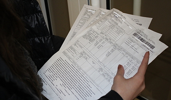 Липкие стикеры и автодозвон: В Воронеже УК запускают новые методы борьбы с неплательщиками