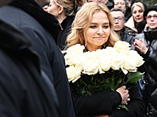Вдова Левкина объяснила, почему улыбалась на похоронах мужа
