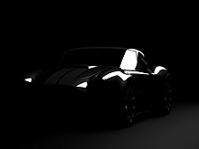 Легендарная британская компания AC Cars опубликовала тизер нового родстера Cobra